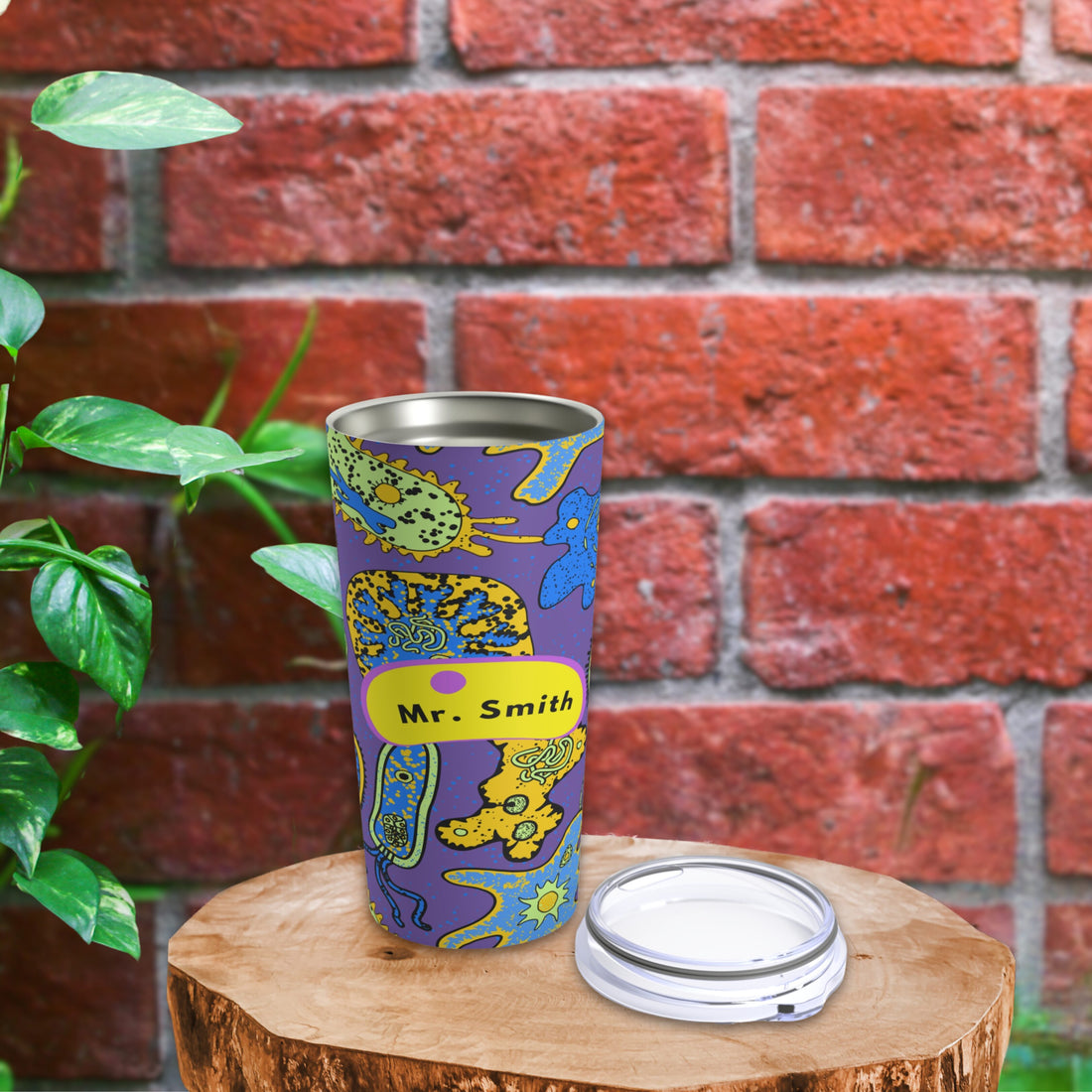 "Personalized biology-themed tumbler featuring abstract science illustrations, including microorganisms and cells, on a vibrant purple background. Perfect for biology enthusiasts and students. #BiologyTumbler #ScienceMerchandise #PersonalizedTumbler #BiologyLovers #ScienceGift #EcoFriendlyTumbler #StudentEssentials #ScienceDecor #BiologyClass"